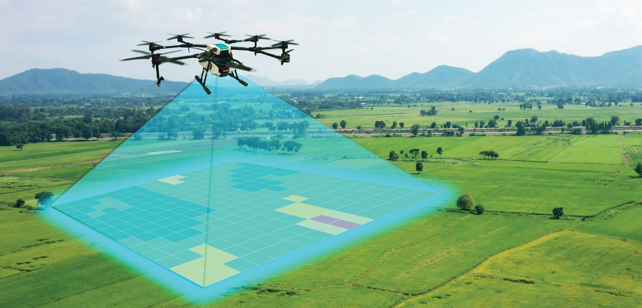 A drone flies over a landscape mapping a square section of grass.