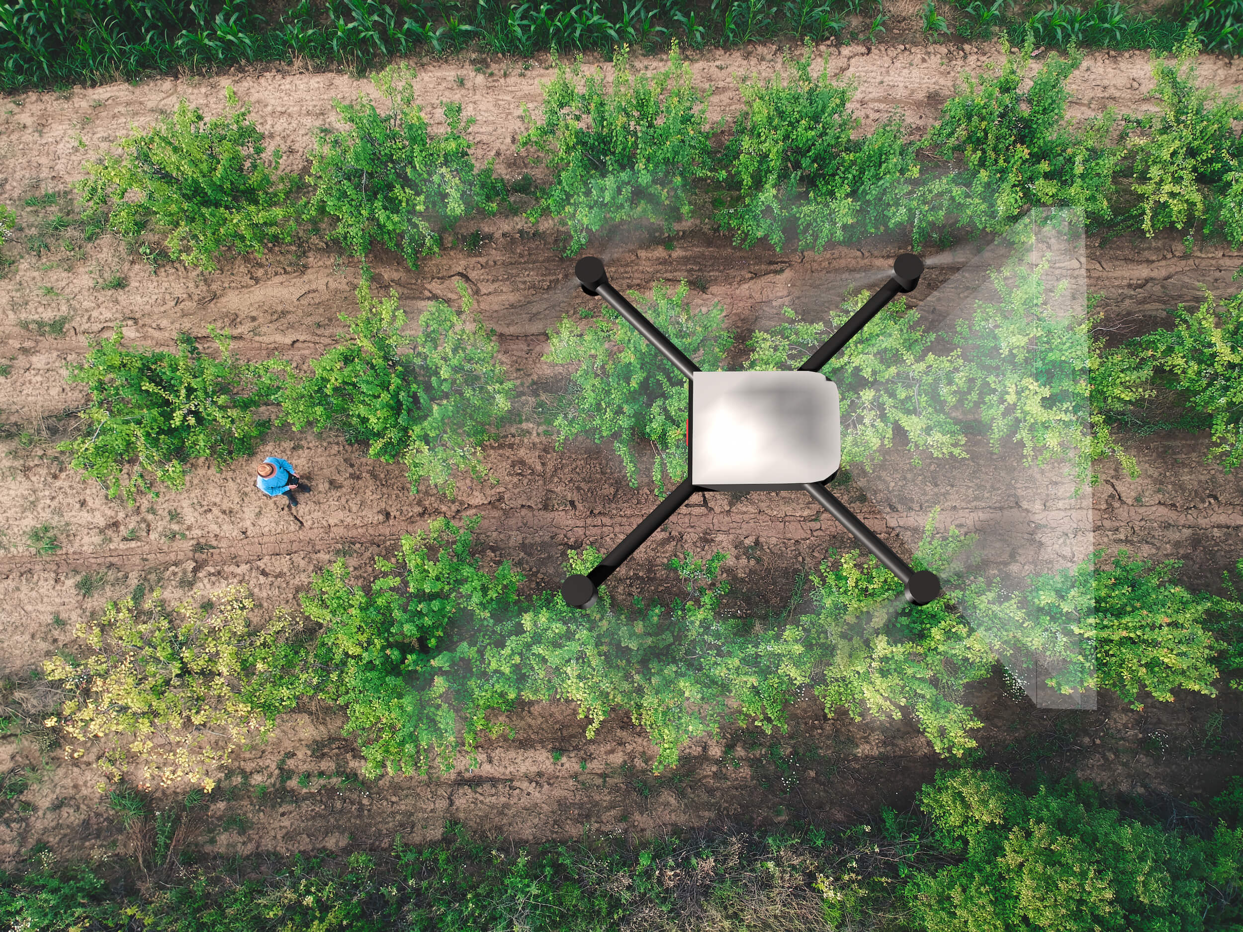agricultural farmer using drone for soil analysis